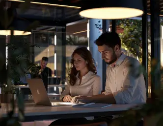 Digital agency team working late on web design strategy to elevate UK brand presence